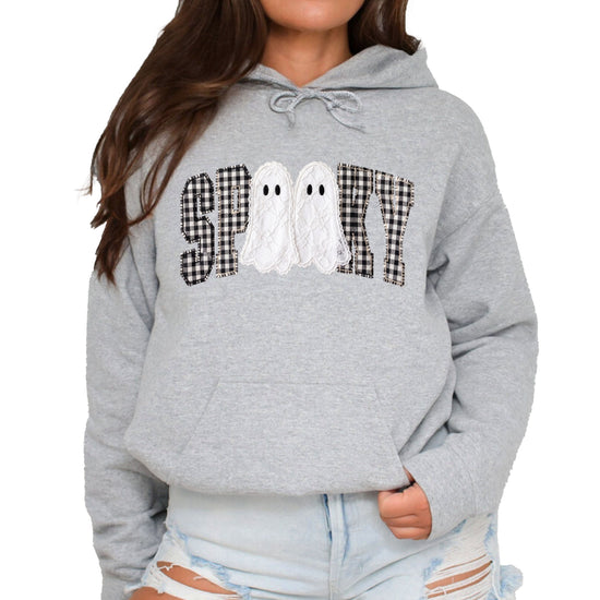 Gray hoodie with ink-printed spooky ghost gingham check graphic, front view