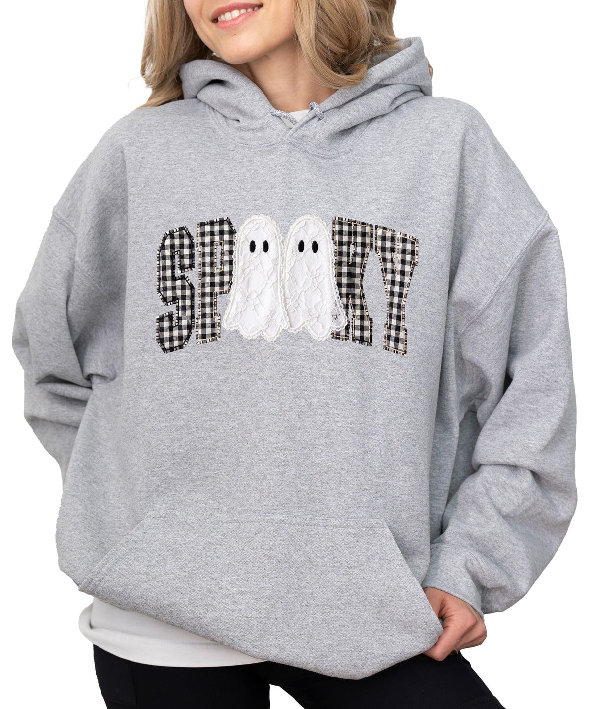 Gray spooky ghost gingham hoodie shown on a model, front view