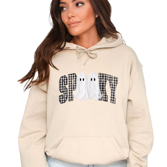 Sand hoodie with ink-printed spooky ghost gingham check graphic, front view