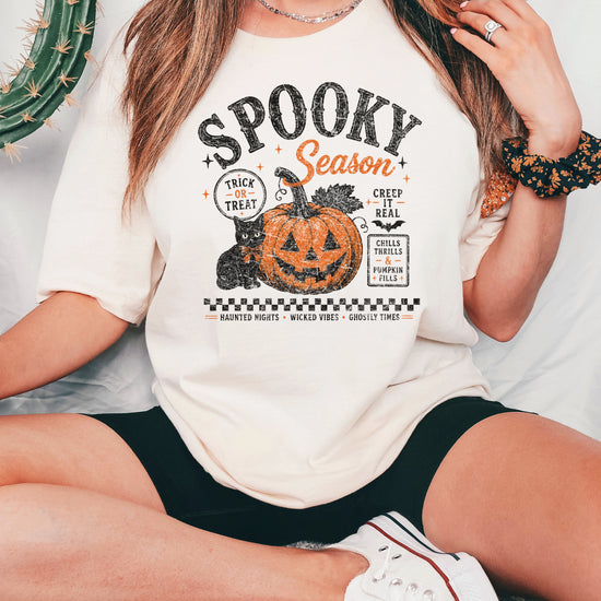 Spooky Season Halloween pumpkin black cat tee in Ivory, lifestyle shot