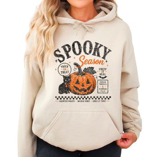 Sand hoodie with retro Halloween jack-o-lantern and black cat graphic, front view