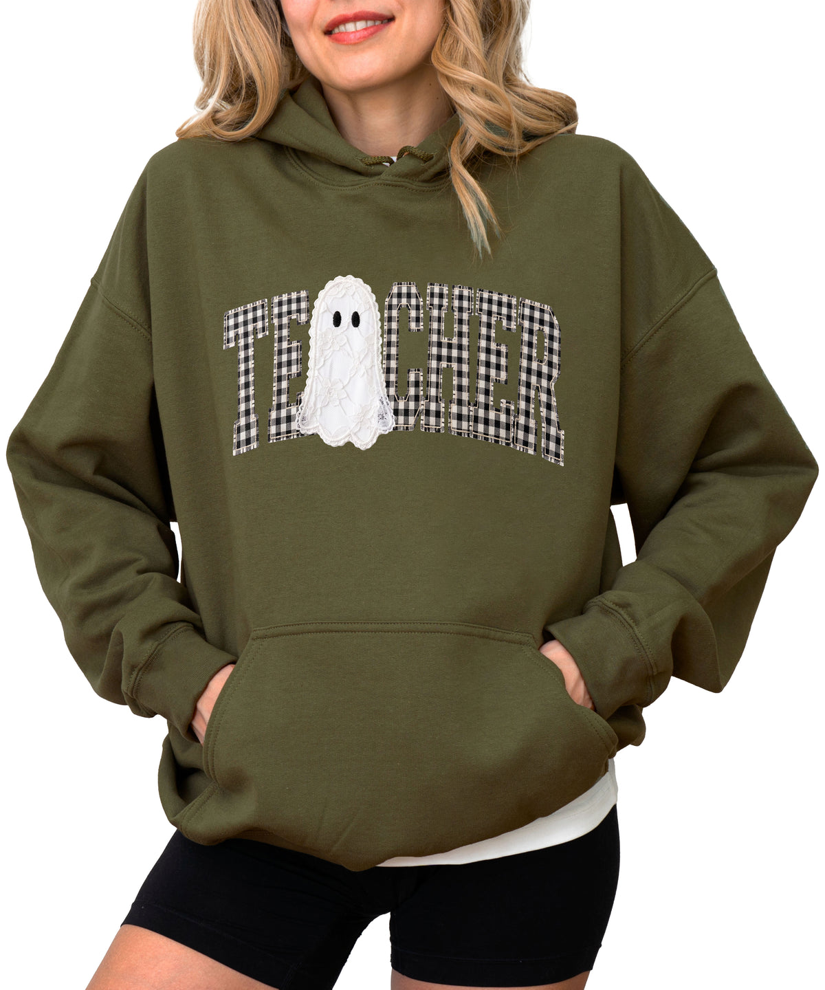 Army green hoodie with ink-printed gingham ghost teacher Halloween graphic, front view