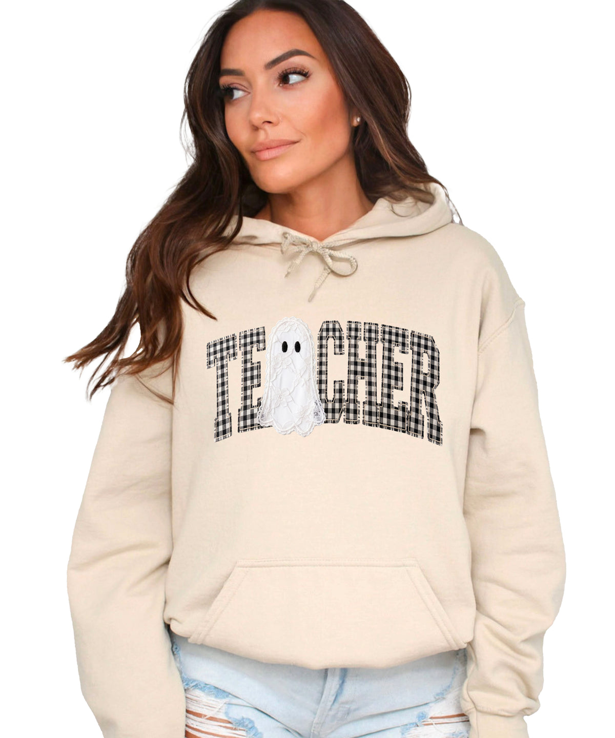 Sand hoodie with ink-printed gingham ghost teacher Halloween graphic, front view