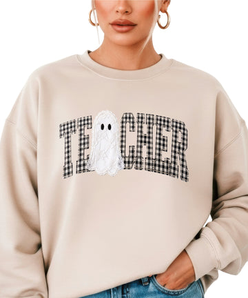 Sand crewneck sweatshirt with ink-printed gingham checkered TEACHER lettering and lace-look ghost, front view