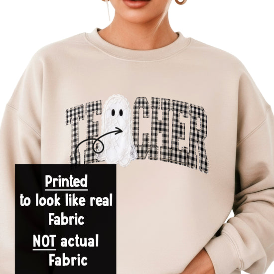 Close-up of the ink-printed gingham checkered TEACHER graphic with lace-look ghost