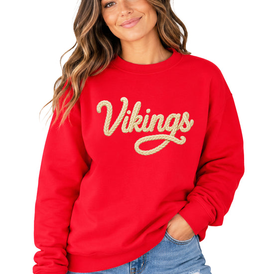 Vikings yarn script school spirit crewneck sweatshirt in Red, front view