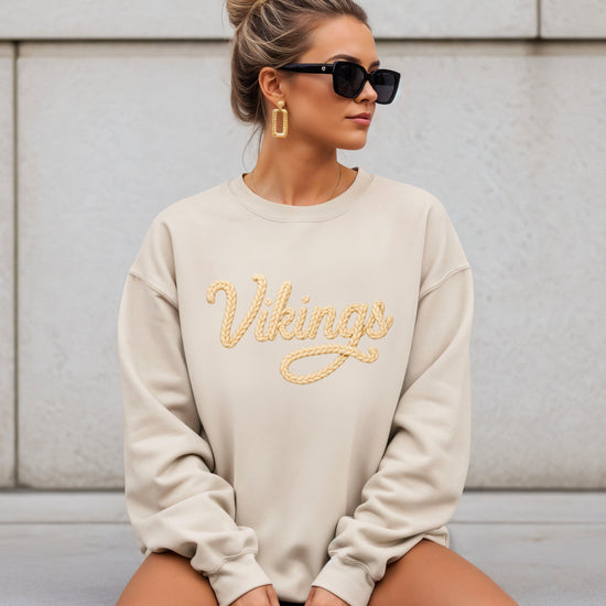 Vikings yarn script school spirit crewneck sweatshirt in Sand, lifestyle view