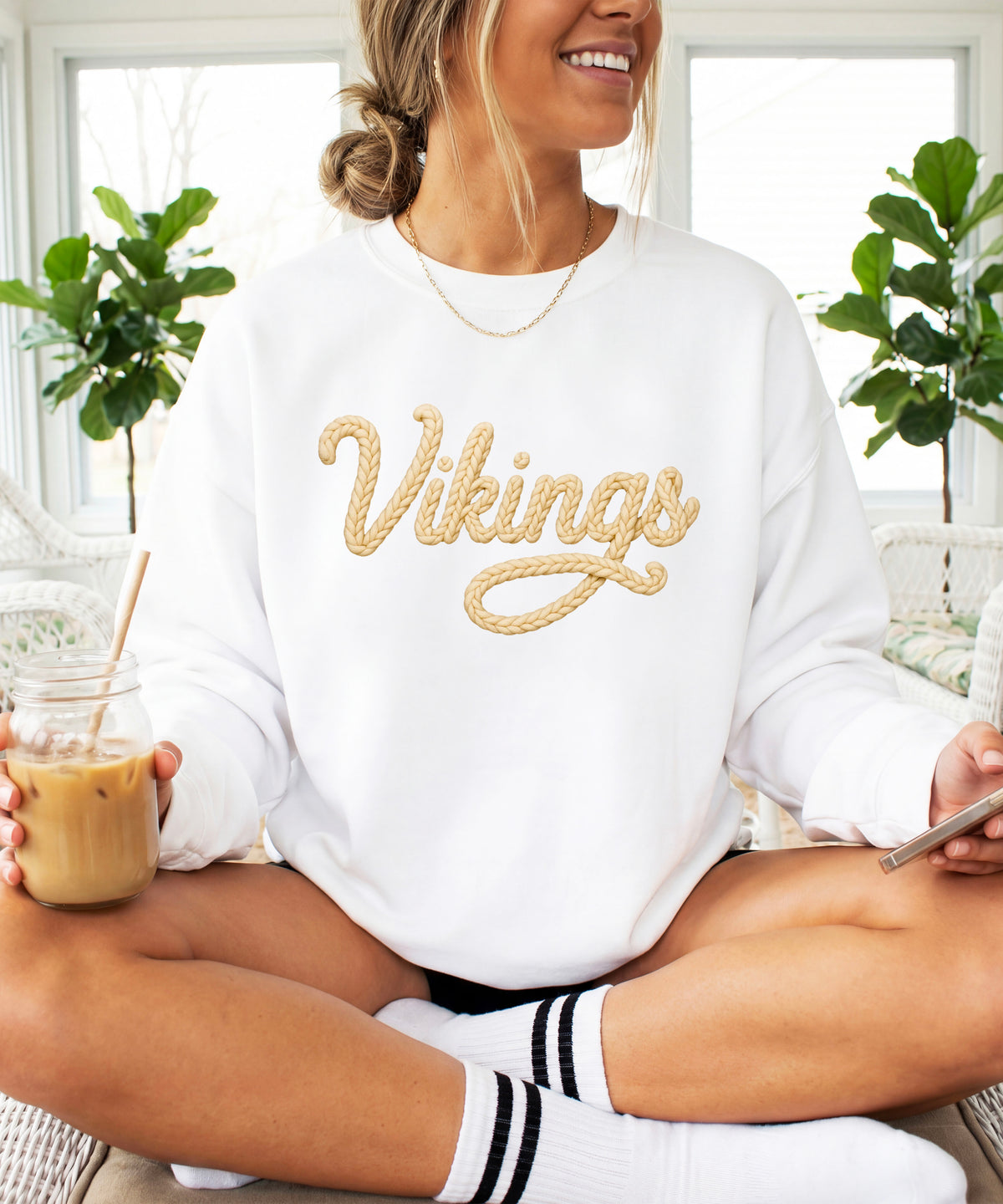 Vikings yarn script school spirit crewneck sweatshirt in White, lifestyle view