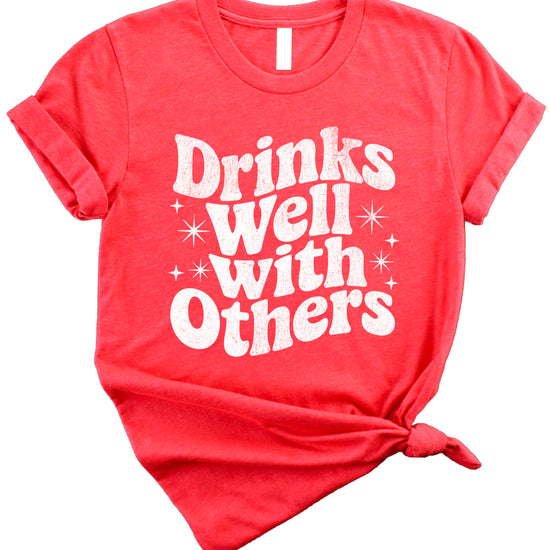 Drinks Well With Others funny graphic tee for women in Vintage Red, lifestyle view
