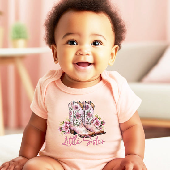 Peach Little Sister bodysuit, snap closure detail
