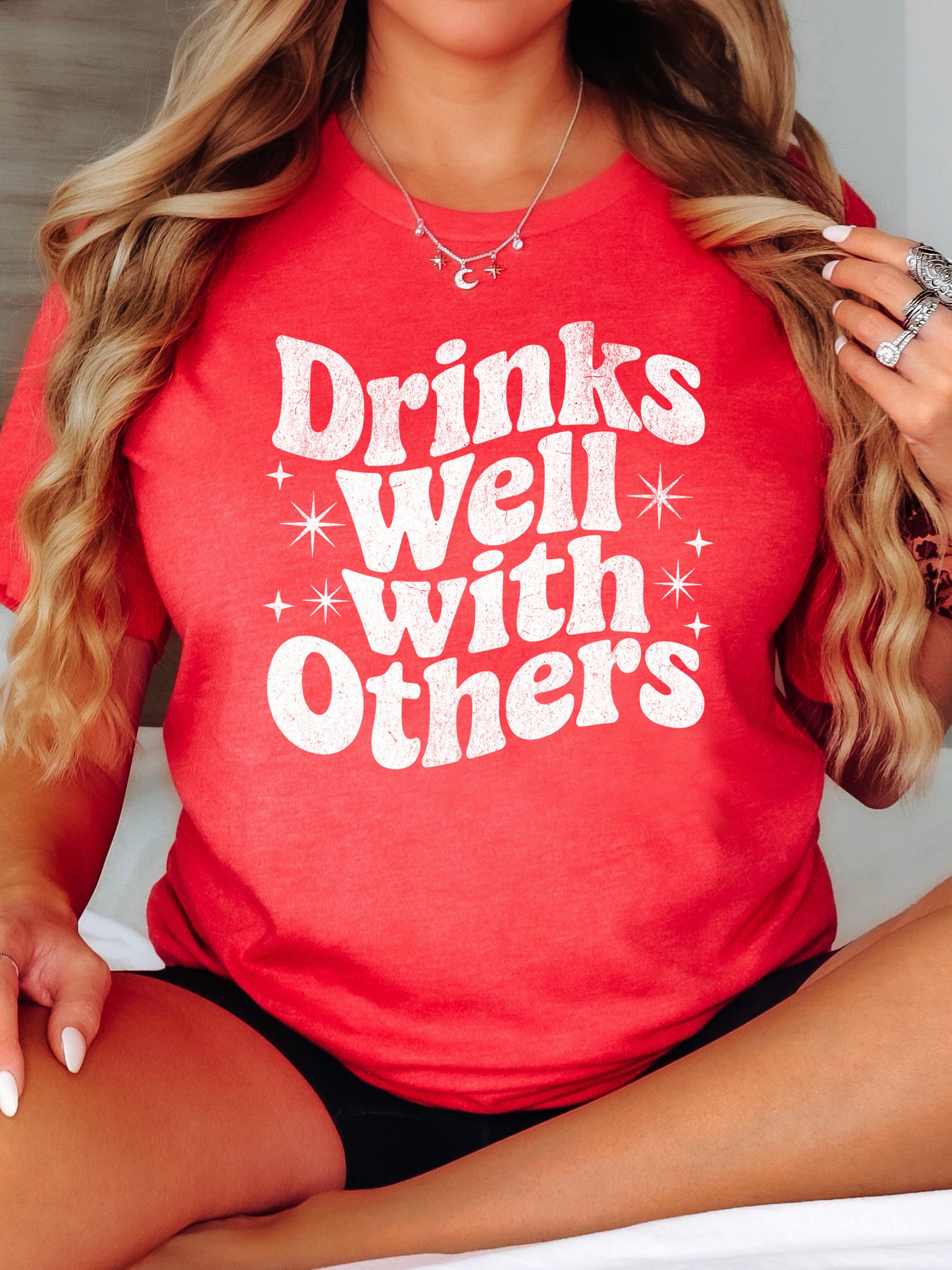 Drinks Well With Others funny graphic tee for women in Vintage Red, back view