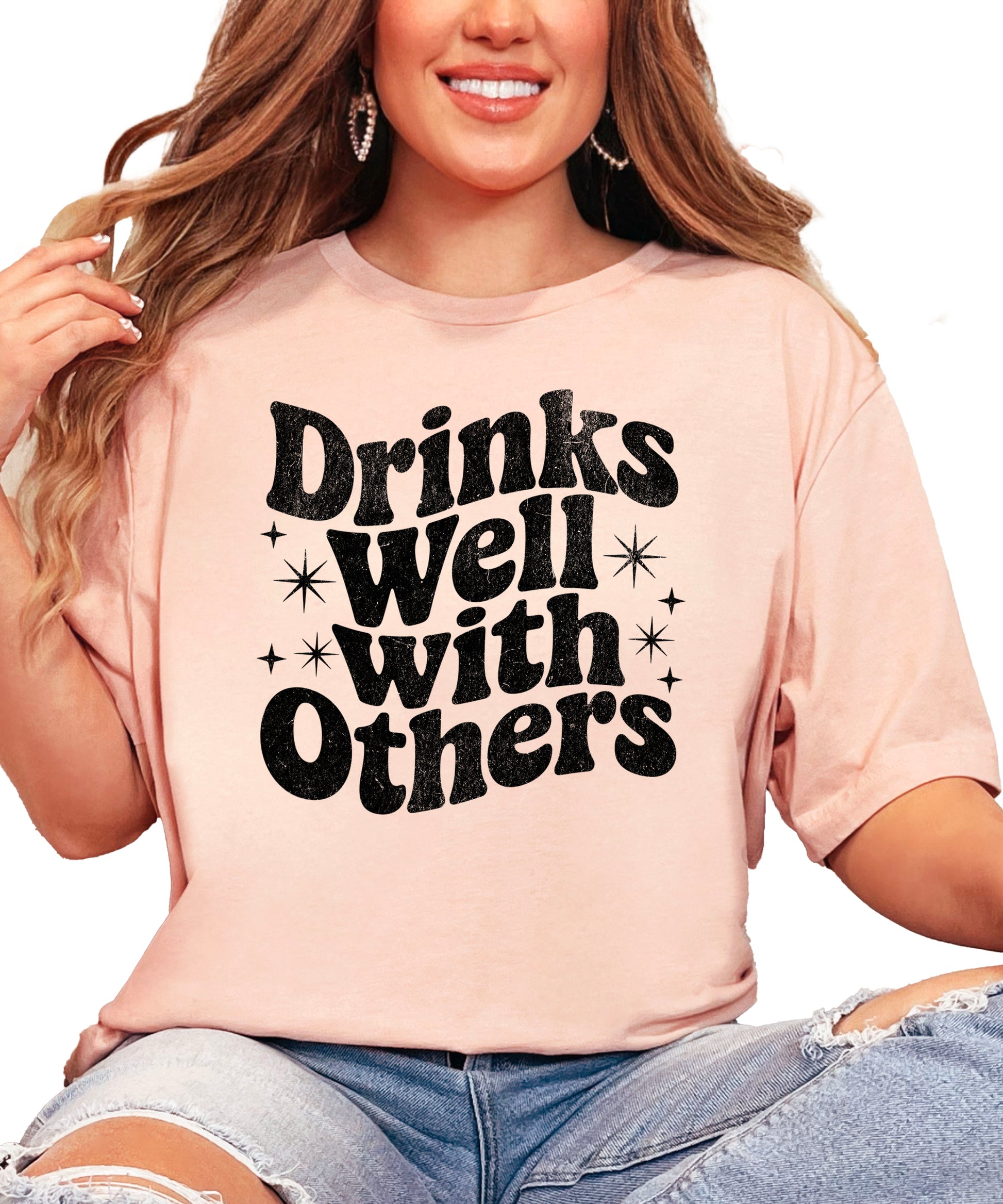 Drinks Well With Others funny graphic tee for women in Peach, detail view