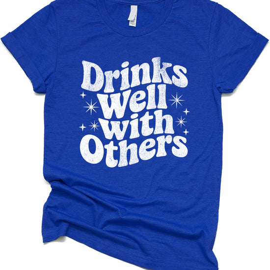 Drinks Well With Others funny graphic tee for women in Vintage Royal, lifestyle view