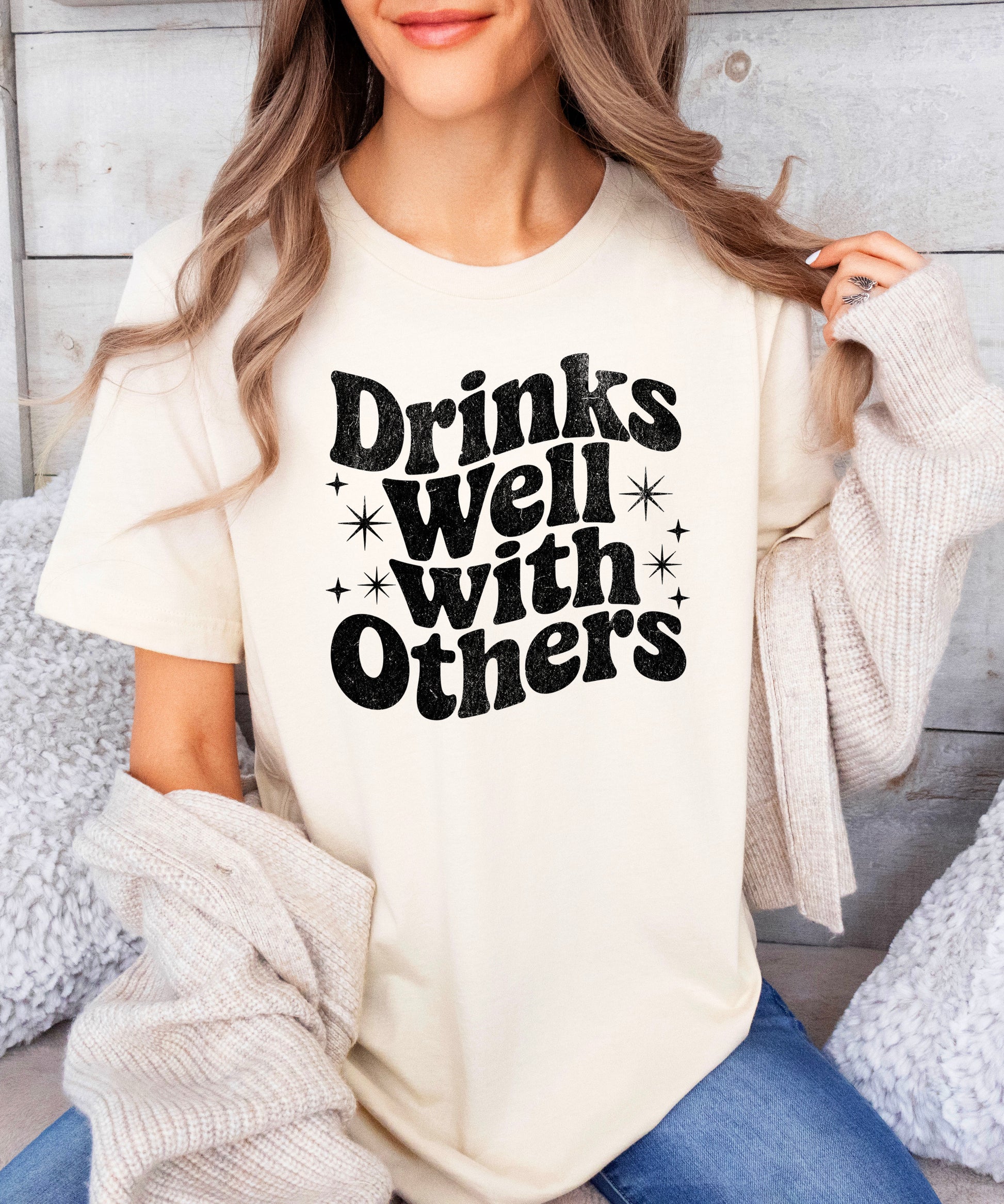 Drinks Well With Others funny graphic tee for women in Natural, back view