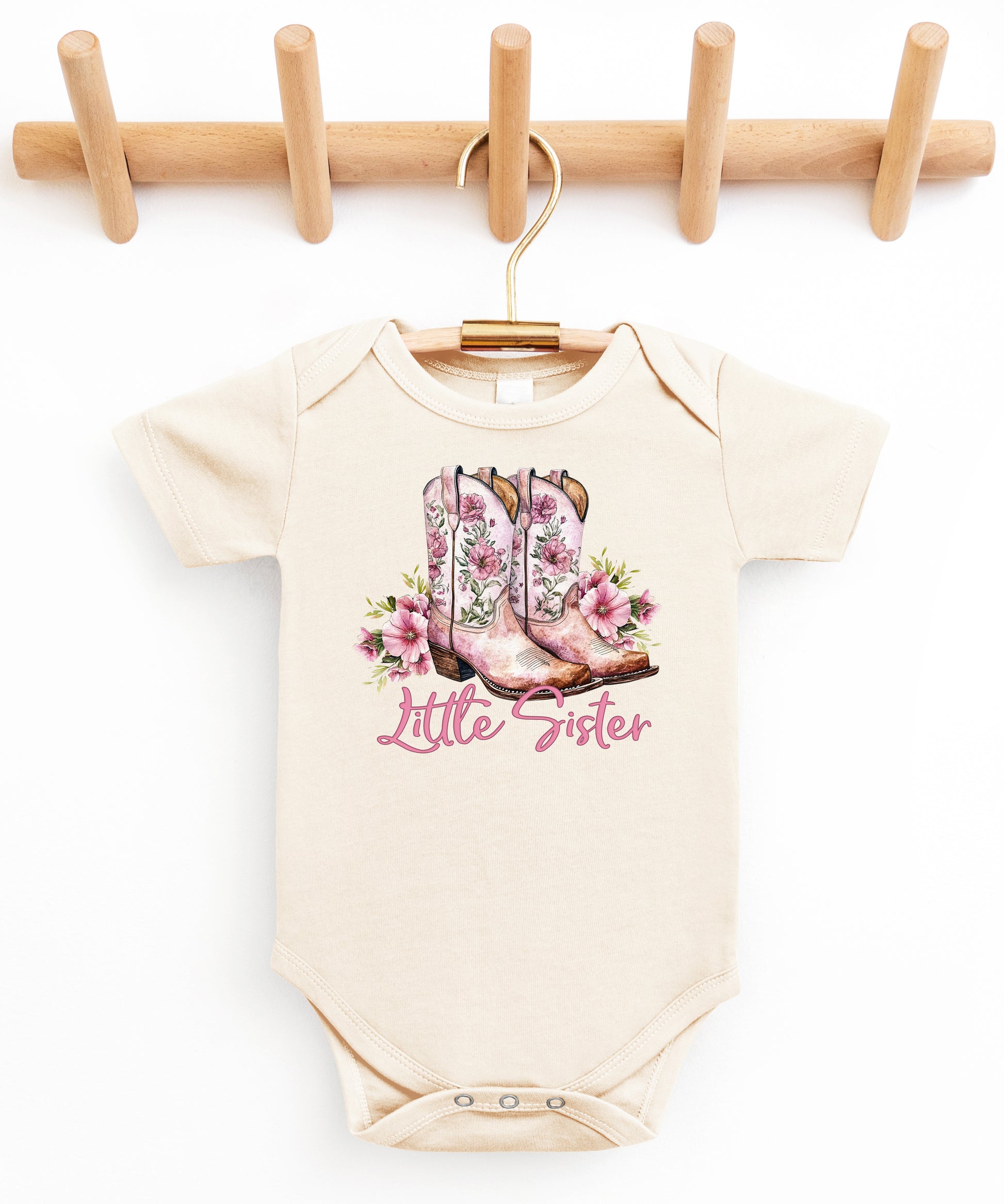 Natural Little Sister bodysuit, styled flat lay