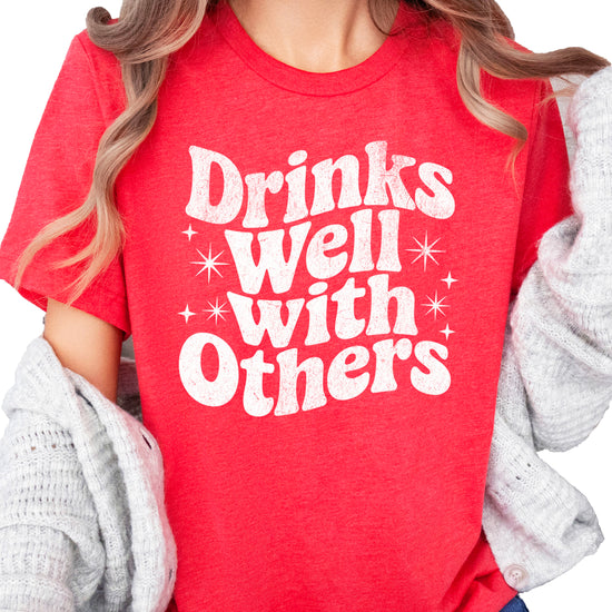 Drinks Well With Others funny graphic tee for women in Vintage Red, front view