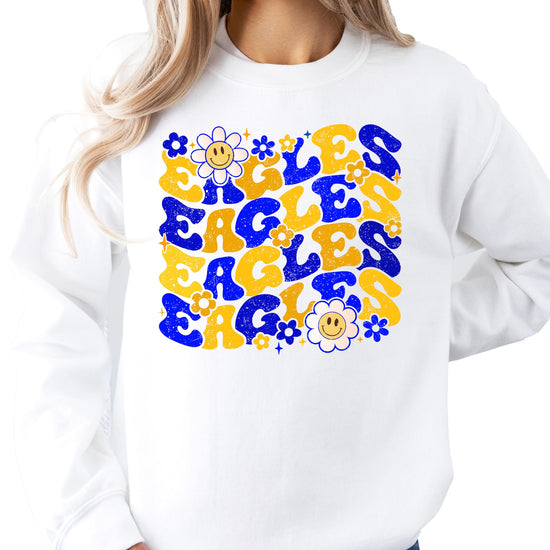 Close-up of bold retro EAGLES lettering and colorful flower graphic on gray sweatshirt