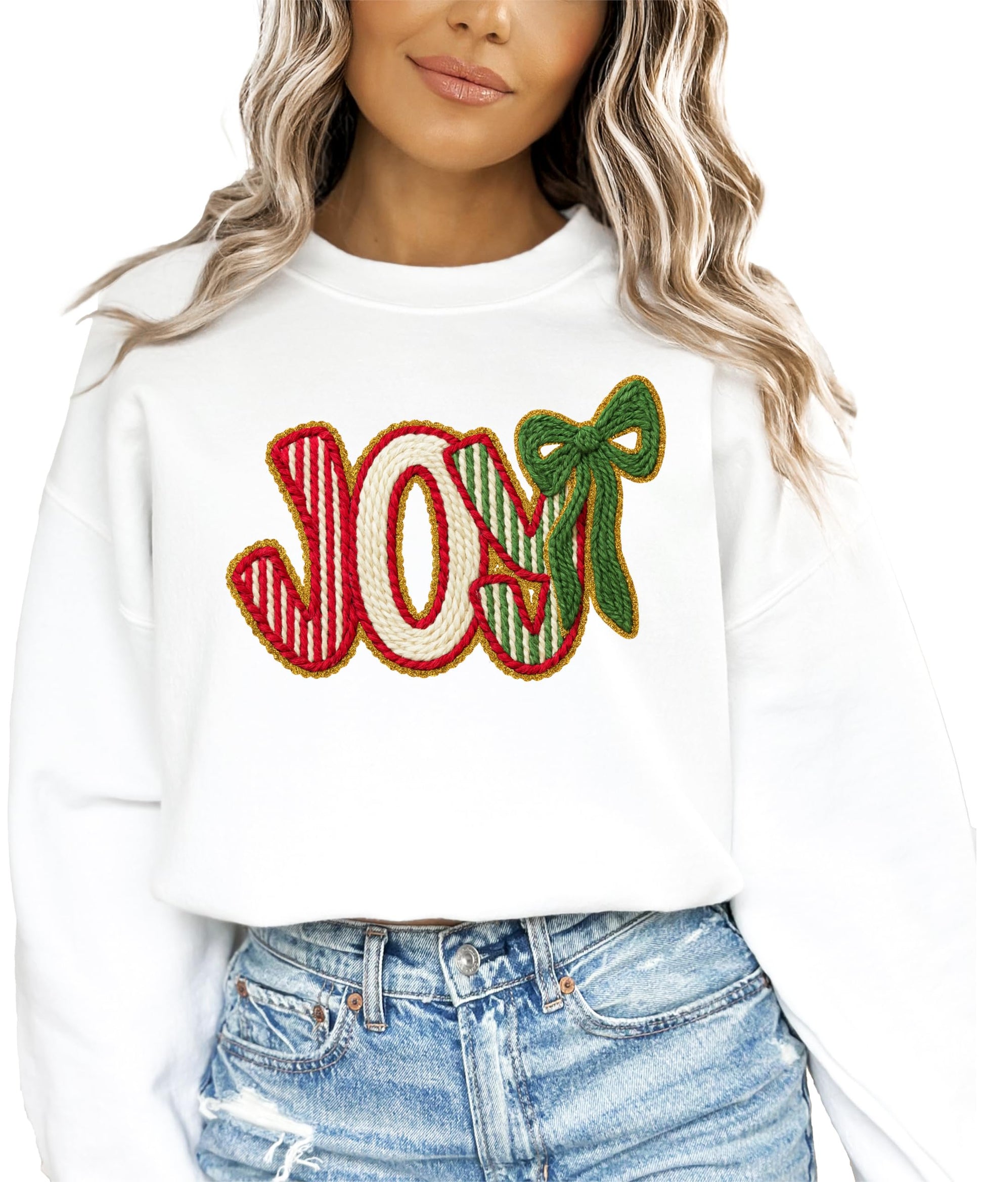 Flat lay of women's JOY holiday sweatshirt with Christmas graphic print detail