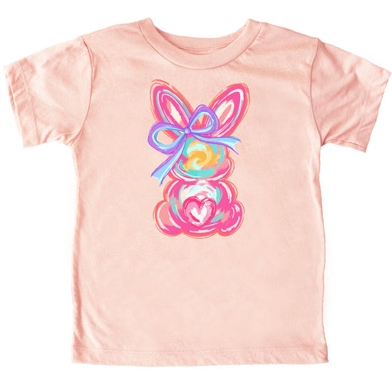 Young girl wearing purple Easter bunny graphic tee, spring coquette style