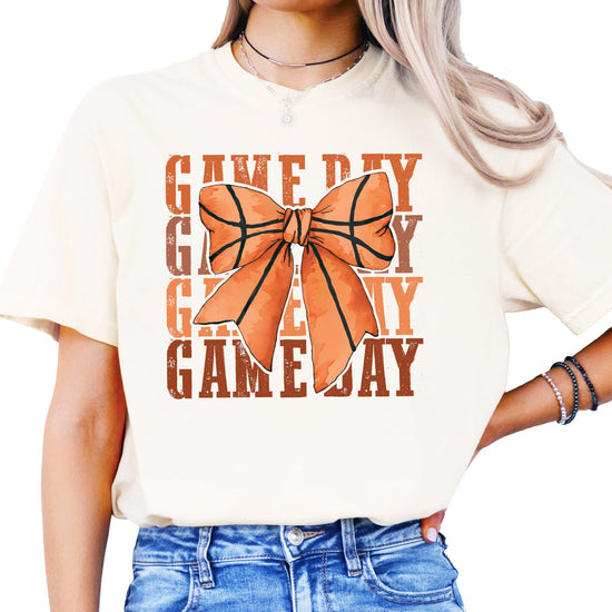Full front view of girly basketball t-shirt with bow graphic
