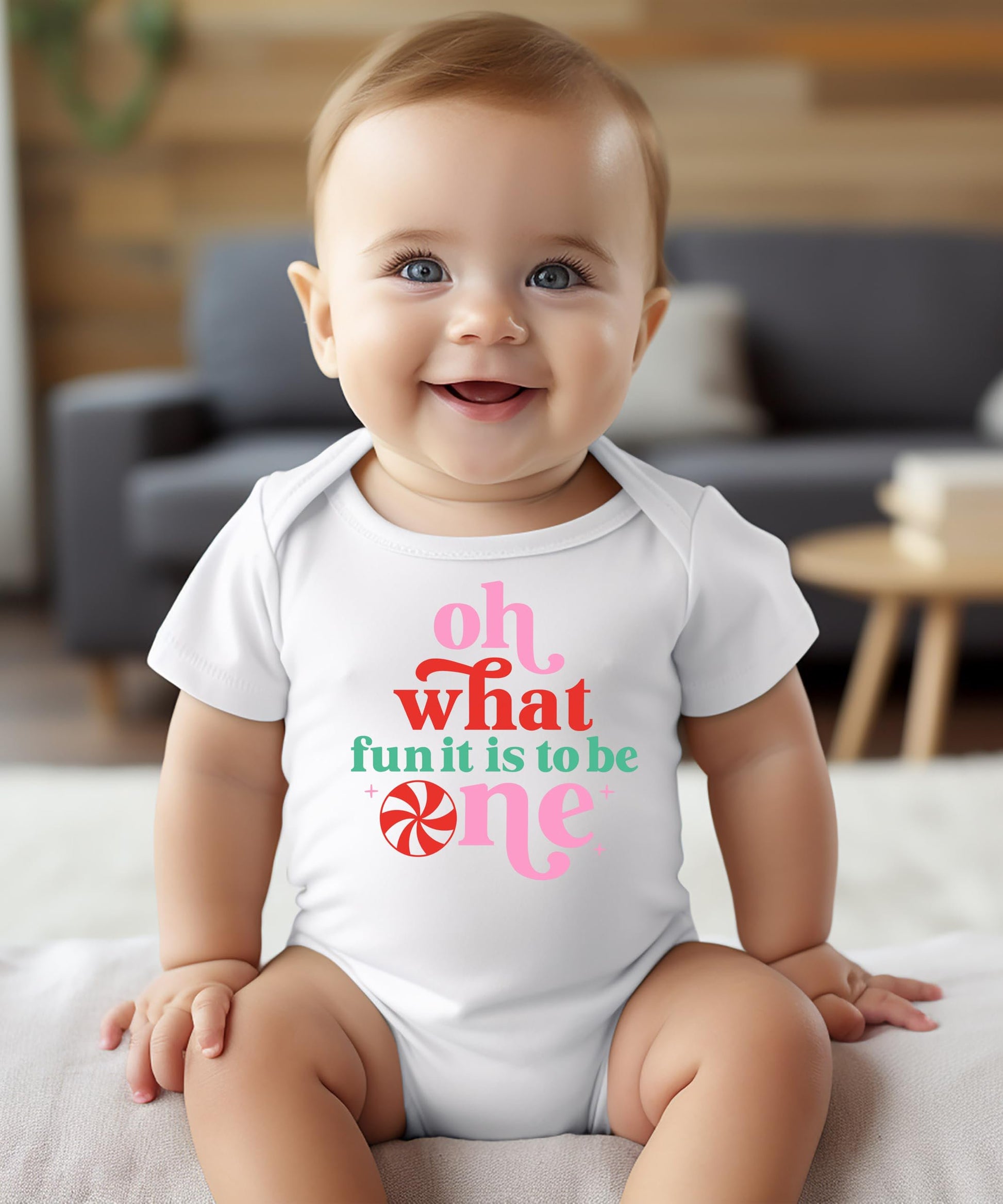 Baby girl wearing Oh What Fun It Is To Be One Christmas birthday one-piece bodysuit