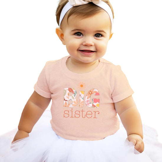 Kids Big Sister floral daisy tee laid flat showing full graphic print detail