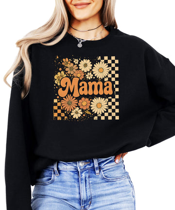 Women's black crewneck sweatshirt with retro checkered and orange daisy floral mama graphic on front