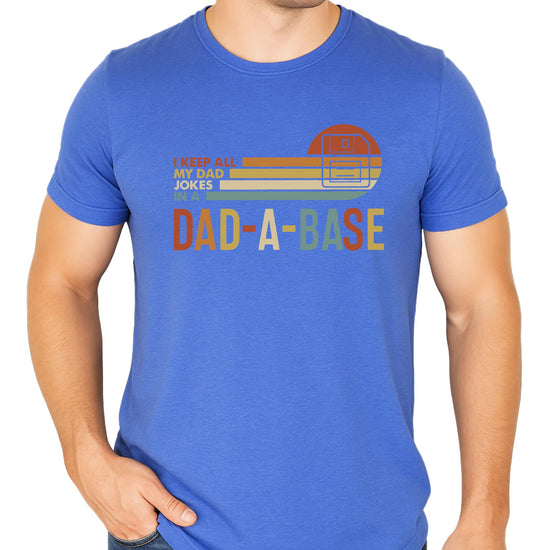 Men's heather blue Dad-A-Base funny dad jokes graphic t-shirt with retro floppy disk design