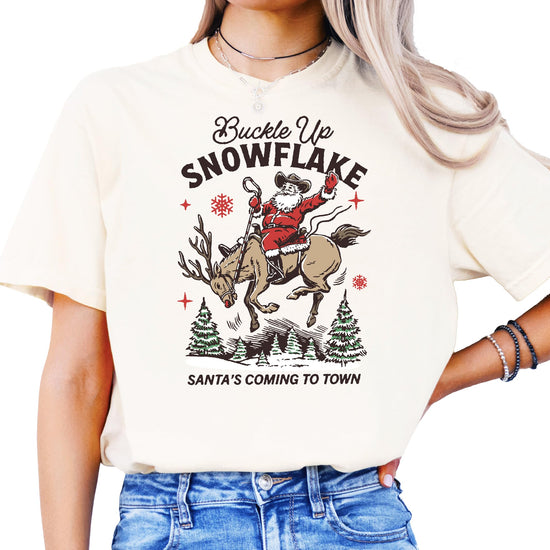 Detail shot of western holiday graphic print on ivory unisex Christmas shirt