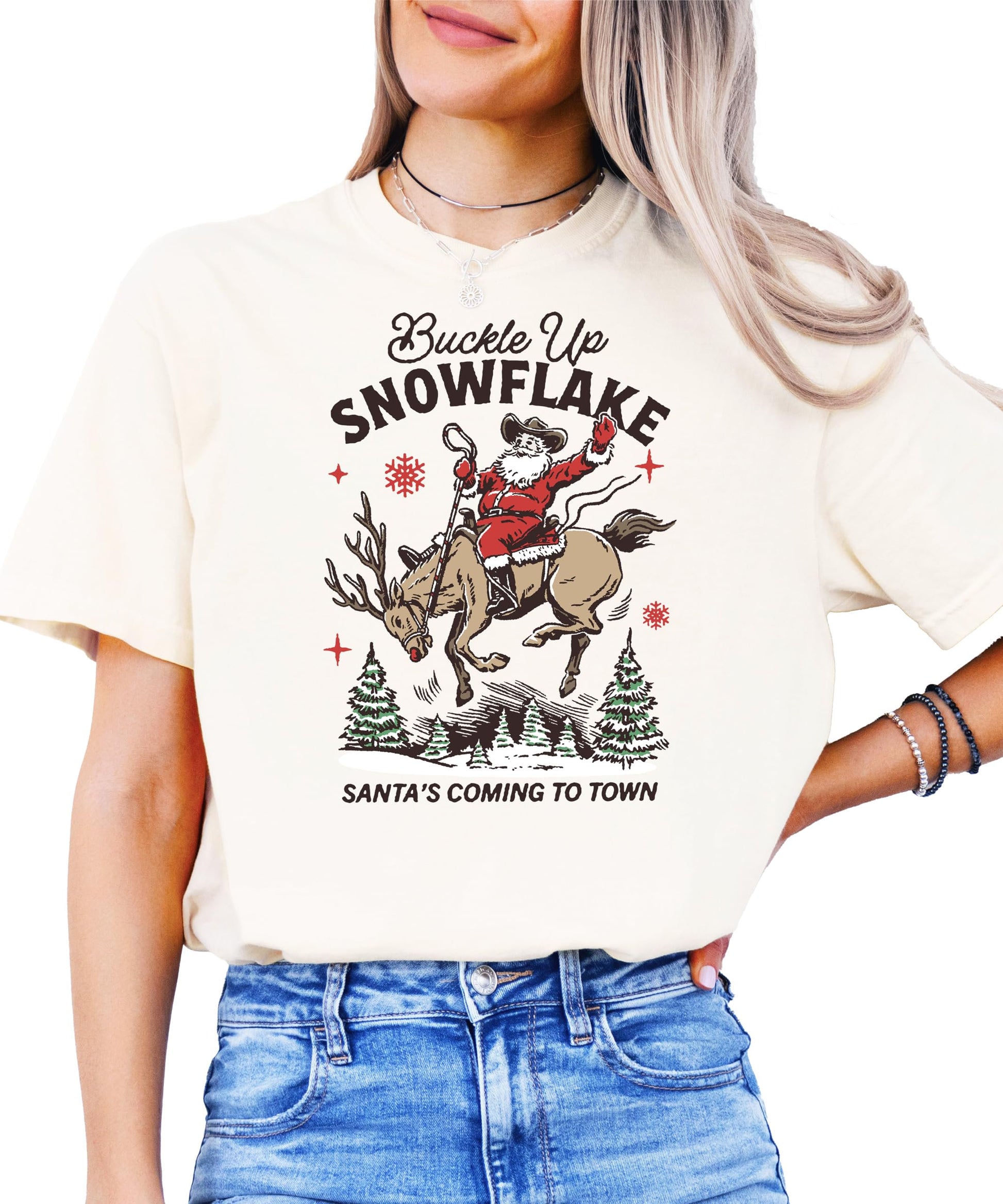 Detail shot of western holiday graphic print on ivory unisex Christmas shirt