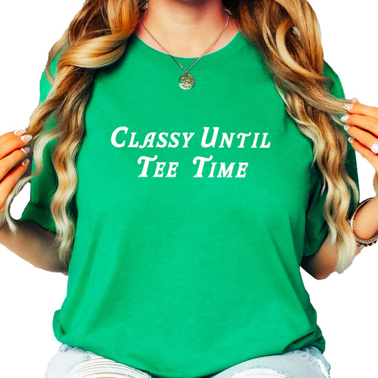 Side or lifestyle view of women wearing Classy Until Tee Time funny golf graphic tee in vintage green