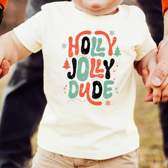 Front view of kids' Holly Jolly Christmas graphic tee showing retro holiday print
