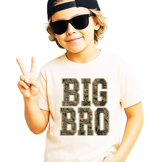 Flat lay of Big Bro camouflage graphic tee for boys showing full shirt design and fit