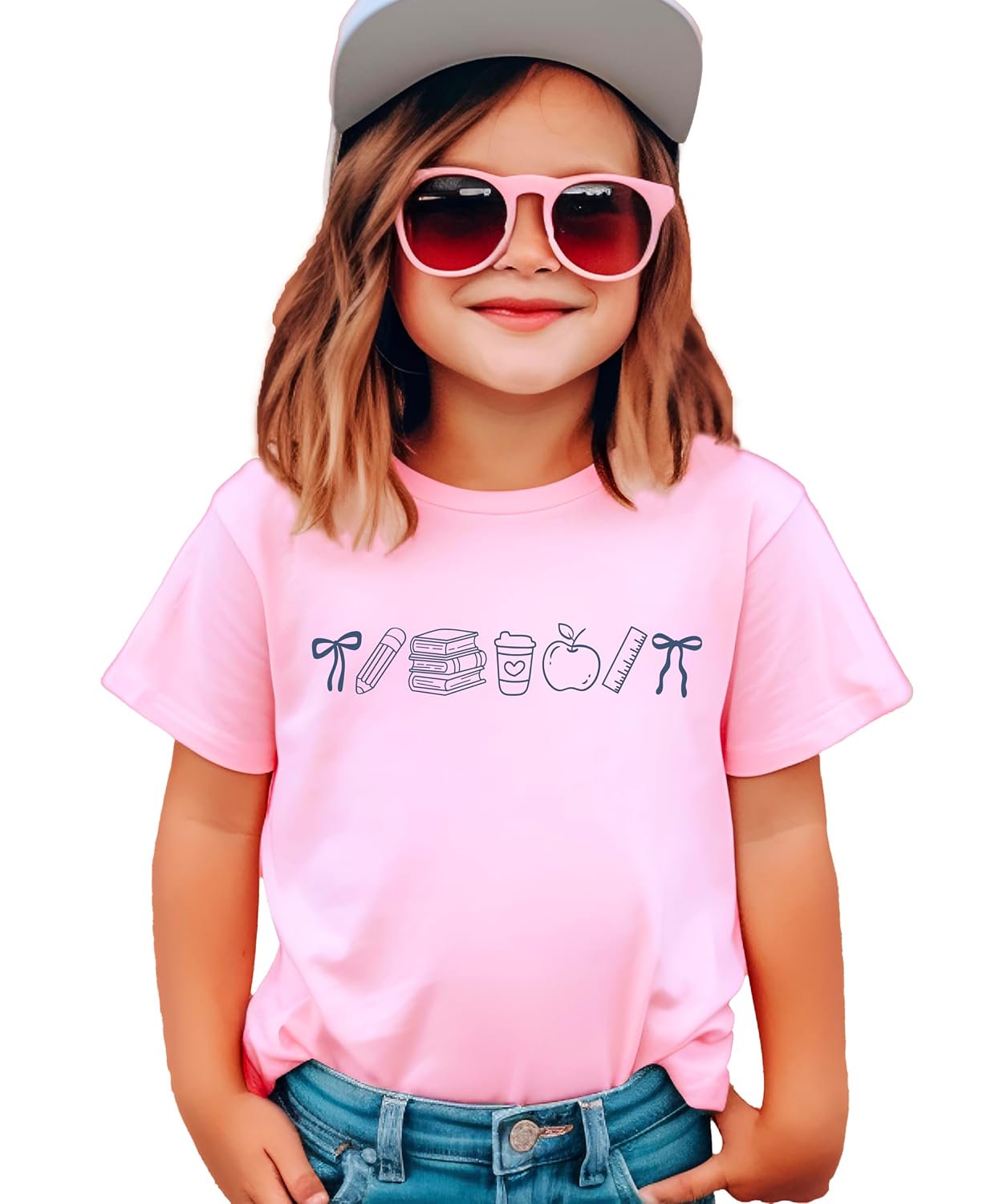 Close-up of coquette bow school supplies screen-printed graphic on pink cotton tee by Olive Loves Apple
