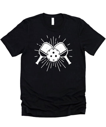 Close-up of pickleball paddle and ball graphic print on black sports tee