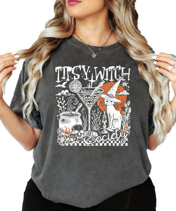 Tipsy Witch Society Halloween tee laid flat showing full front graphic print on black fabric