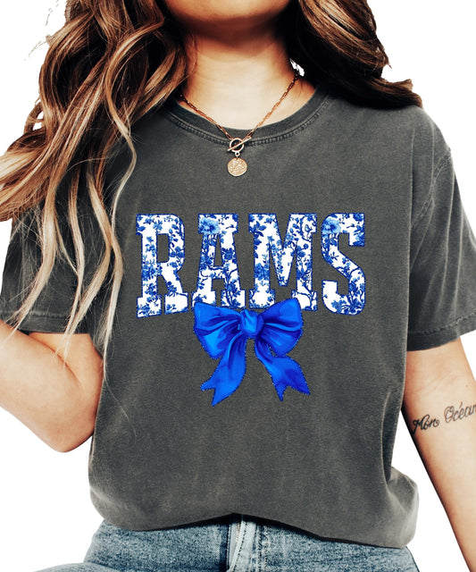 Rams blue floral bow graphic tee shirt in ivory - front view showing team spirit design