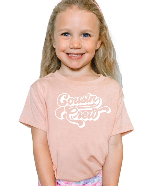 Cousin crew matching family shirts displayed in various colors and sizes