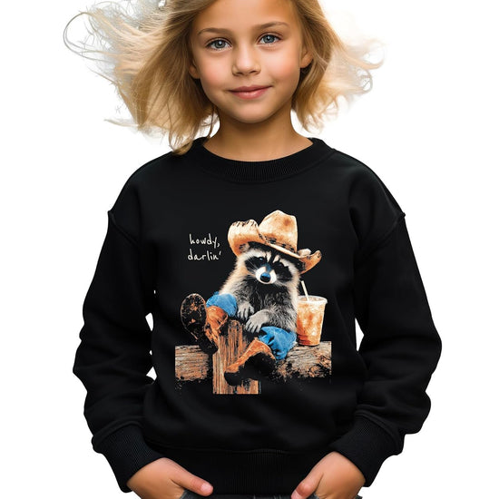 Model wearing black Howdy cowboy raccoon sweatshirt styled casually with jeans