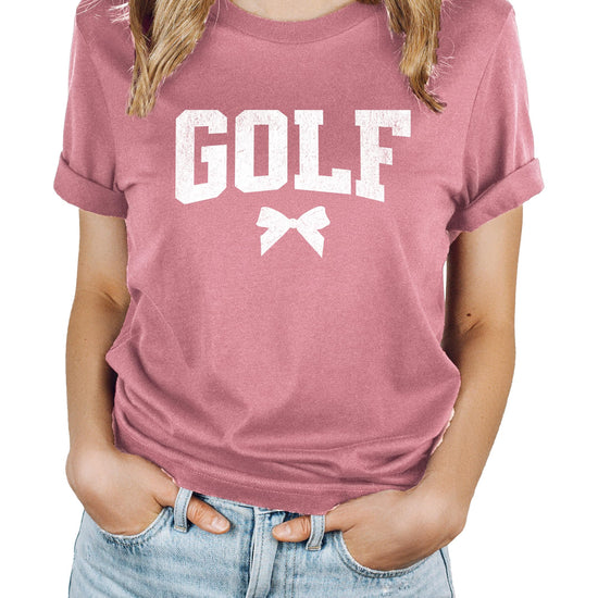 Distressed coquette bow golf graphic tee for women in a vintage-inspired design