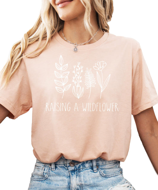 Mommy and me raising wildflowers matching mauve shirts with white graphic print