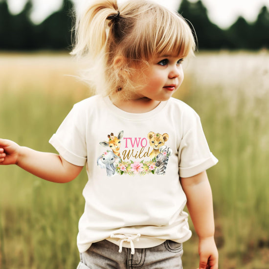 Toddler wearing Two Wild safari birthday shirt showing fit and style