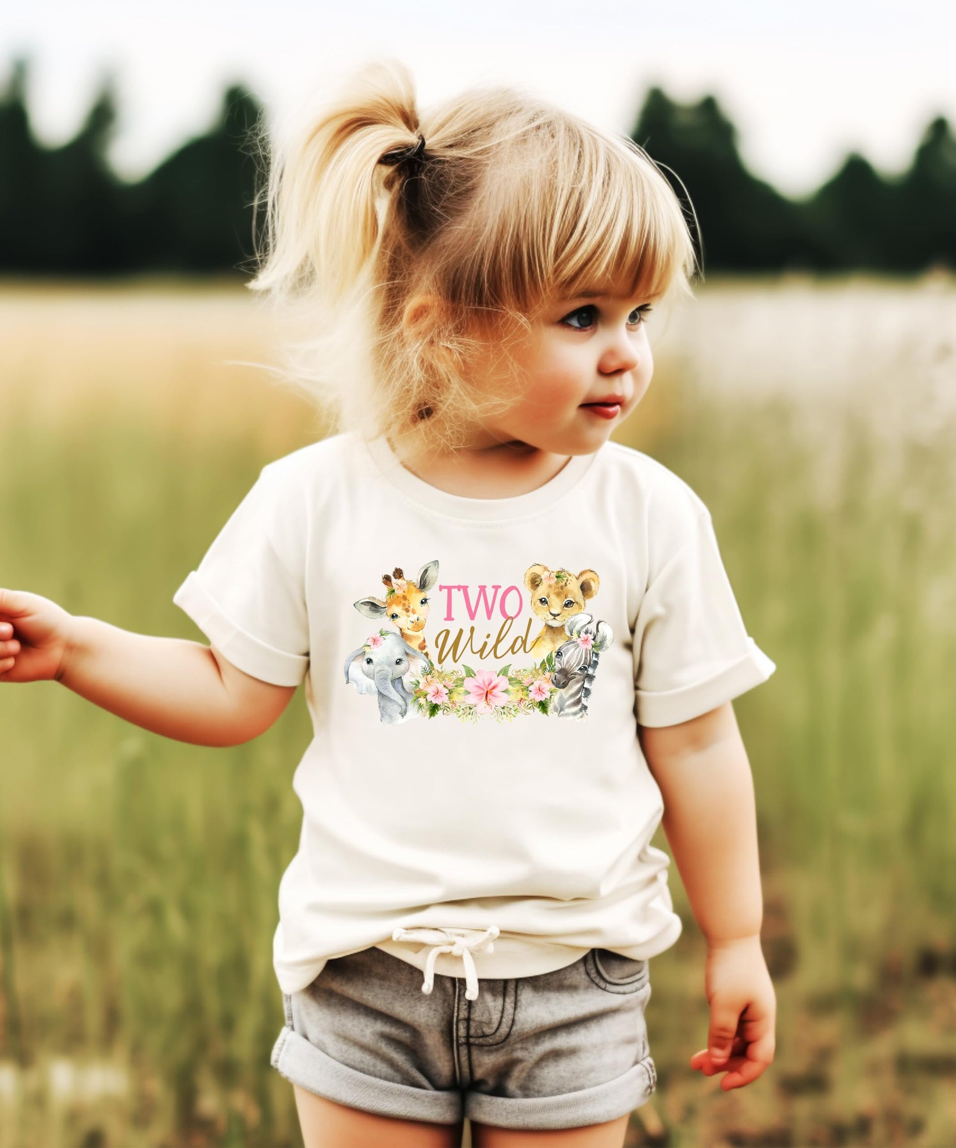 Toddler wearing Two Wild safari birthday shirt showing fit and style