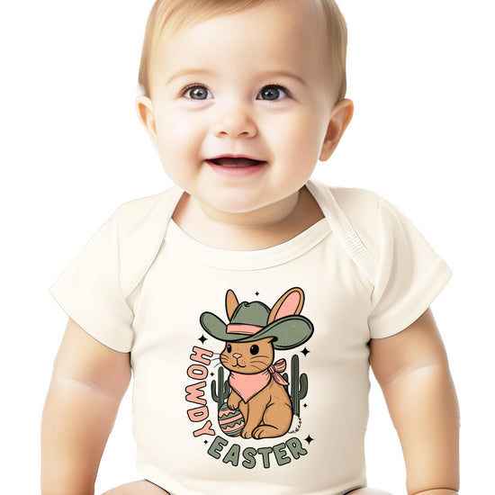 Baby girl wearing western-themed Easter bunny snap bodysuit in peach