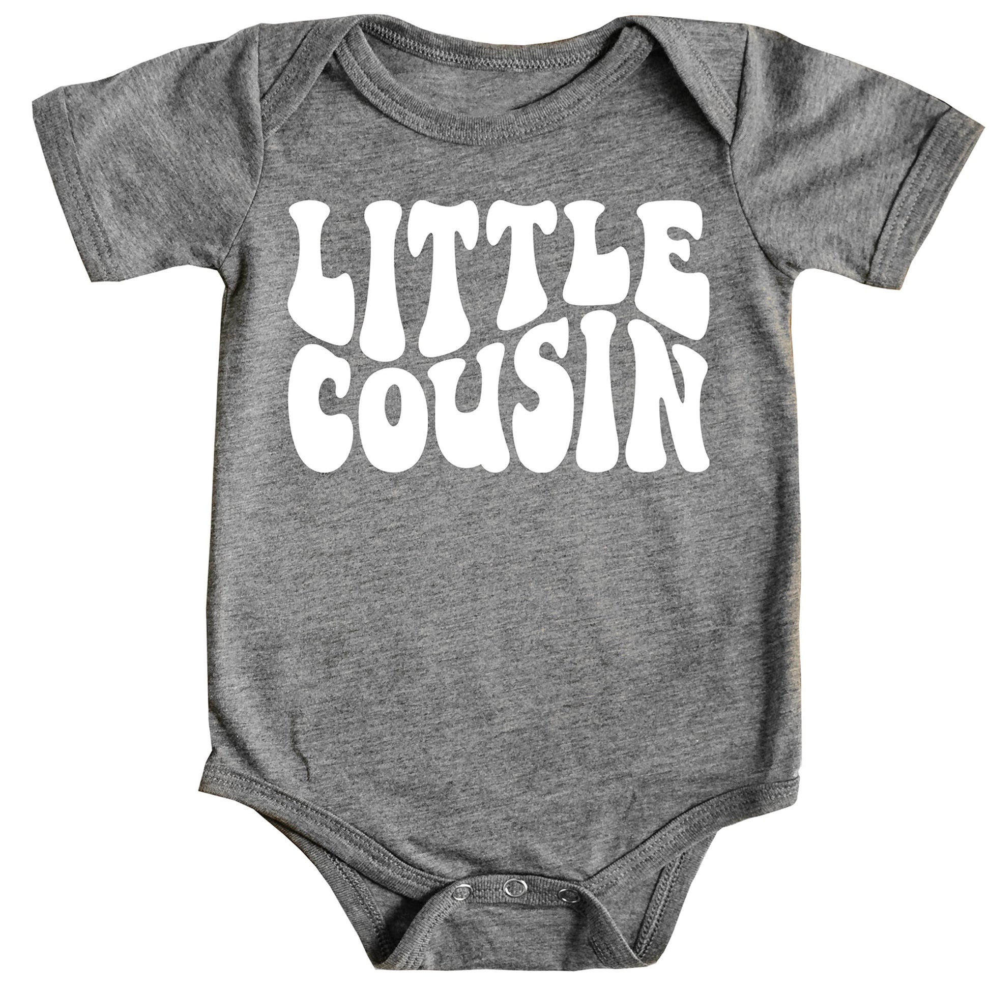 White Little Cousin retro bodysuit on mauve background with groovy lettering