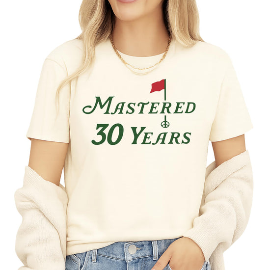 Close-up of Mastered 30 Years golf birthday shirt graphic print on natural colored unisex tee