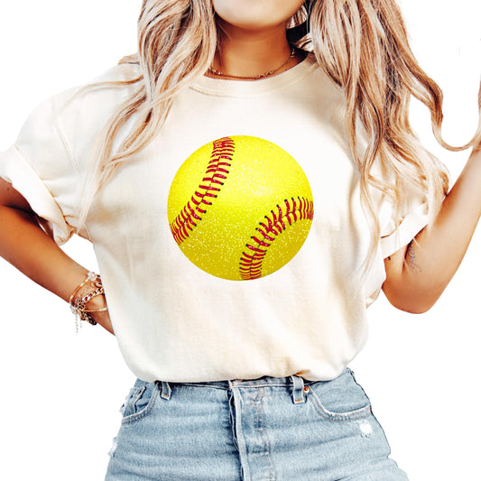 Ivory women's softball graphic tee with faux glitter yellow softball design, front view