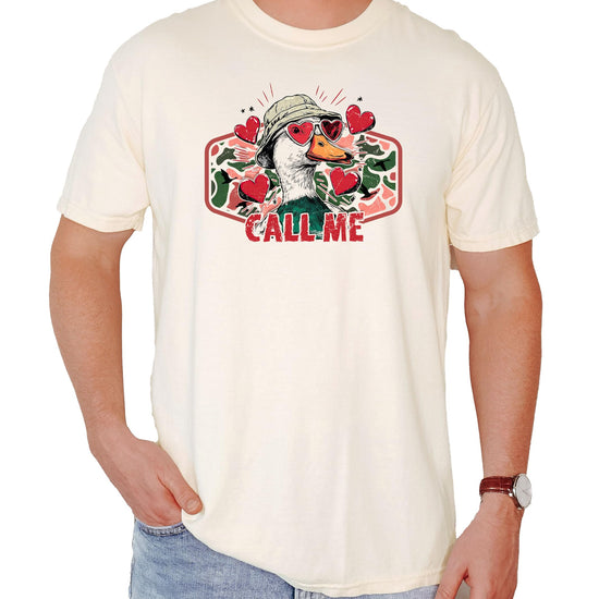 Front view of Call Me Valentine duck hunting graphic tee in ivory on a model