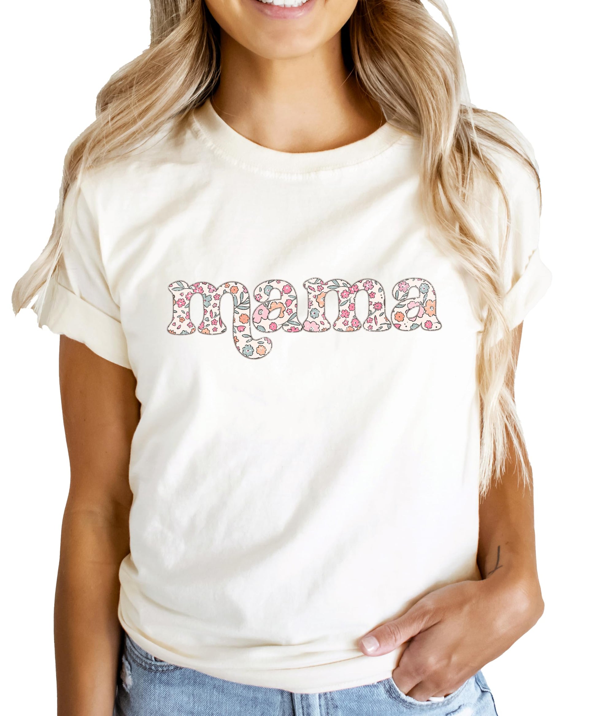 Mama and mini matching pink floral tees laid flat showing full design detail