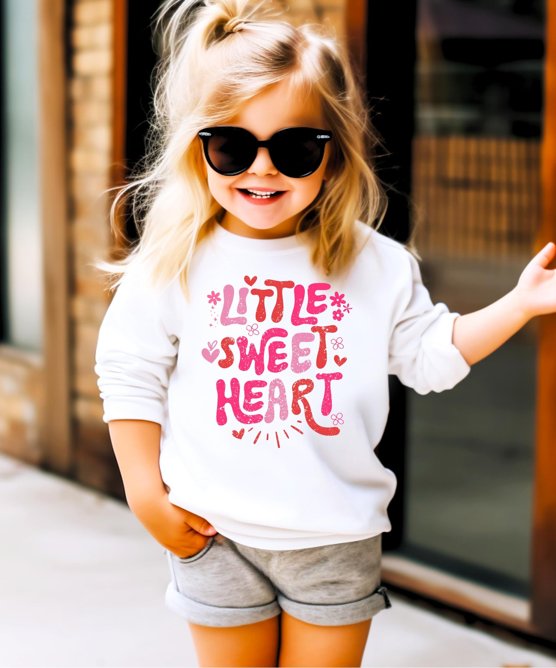 Pink Little Sweet Heart sweatshirt for kids displayed showing full graphic design detail